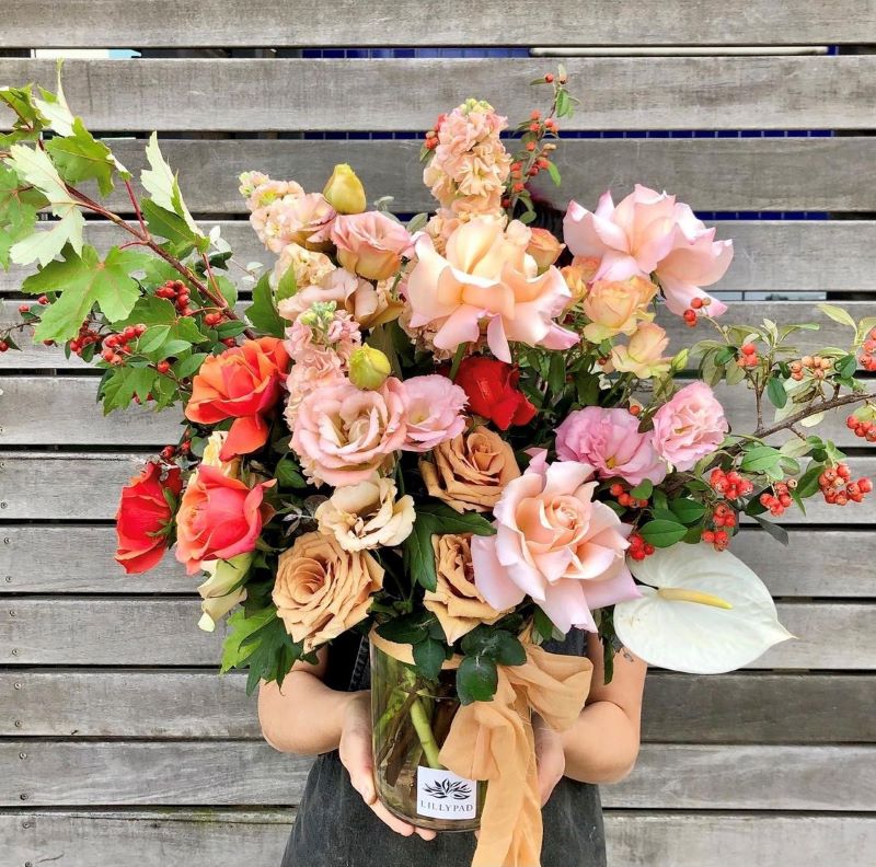 Bouquet of flowers in clear vase seasonal tones thankyou birthday same day flower delivery melbourne