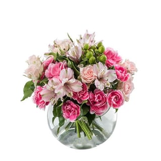 Gorgeous mix of pretty pink seasonal filler blooms in a fishbowl
