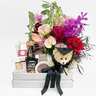 Melbourne graduation gift hamper, graduation teddy and flowers with nibblies to celebrate this joyous occasion.