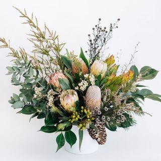 Australian native flower arrangement featuring banksias, proteas, waxflower and seasonals for Melbourne flower delivery