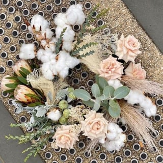 Modern wreath featuring quicksand roses, cotton flower, pampass, proteas.