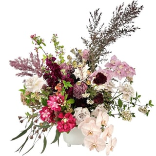 Premium Flower arrangement featuring roses, phalaenopsis, disbuds and seasonals to suit 