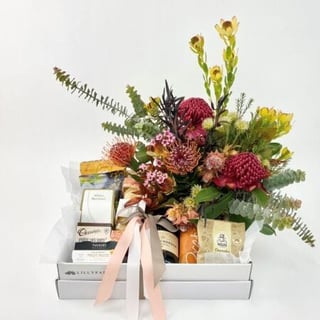 Gift hamper with seasonal native flower arrangement (will vary from image) , Moet Chandon & Savoury/sweet nibblies gift box.