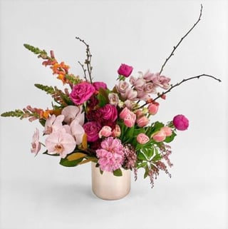 Premium Flower arrangement featuring roses, phalaenopsis, tulips, cymbidium orchids, snapdragons and seasonals to suit . Melbourne same day delivery.