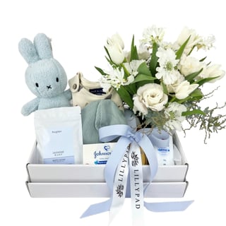 Cosmo - seasonal white bouquet in vase with Miffy, jumpsuit, beanie, Johnsons products, bath soak and flowers.