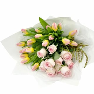 Groupings of tulips and roses in the perfect bouquet for gift giving.