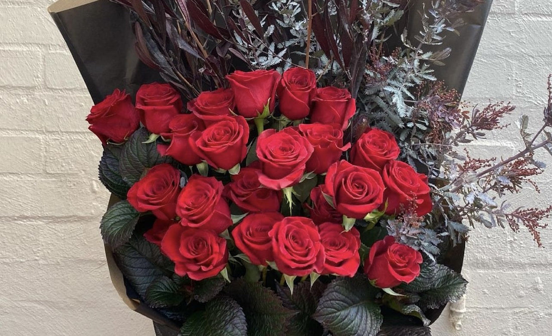 Elegant bouquet of 24 long stem red roses for Valentine’s Day flower delivery in Melbourne