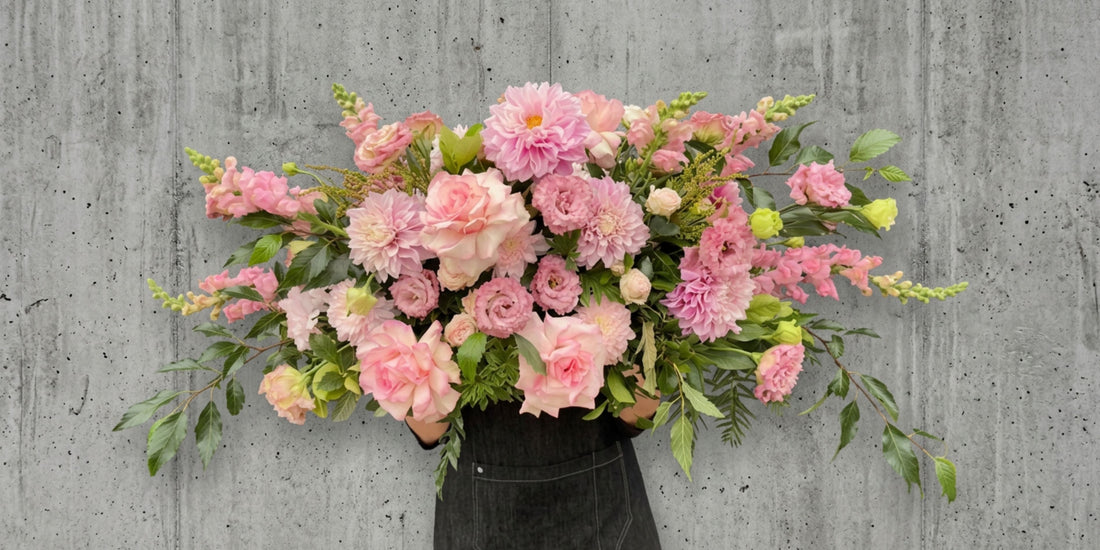 Pink casket coffin roses dahlias lisianthus snapdragons Melbourne Funeral Flowers