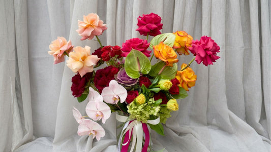 bright colourful bouquet in vase roses orchids peonies anthuriums tulips preston flower delivery Melbourne Florist