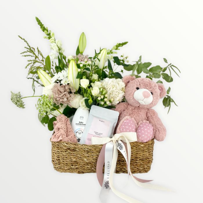 Gift basket with flowers, teddy bear, and baby products flower bouquet new baby melbourne florist