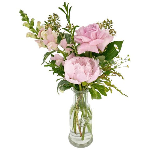 Bouquet of pink flowers in a clear glass vase good luck wishes thankyou melbourne florist