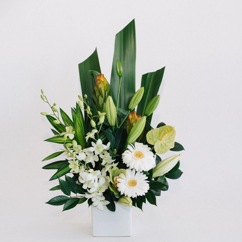 Purity - Arrangement Of Seasonal White Flowers In A Ceramic Vase