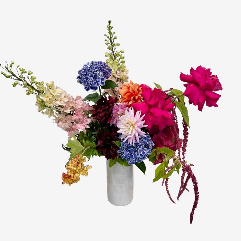 Bright bouquet in vase (flowers and tones may vary upon availability)