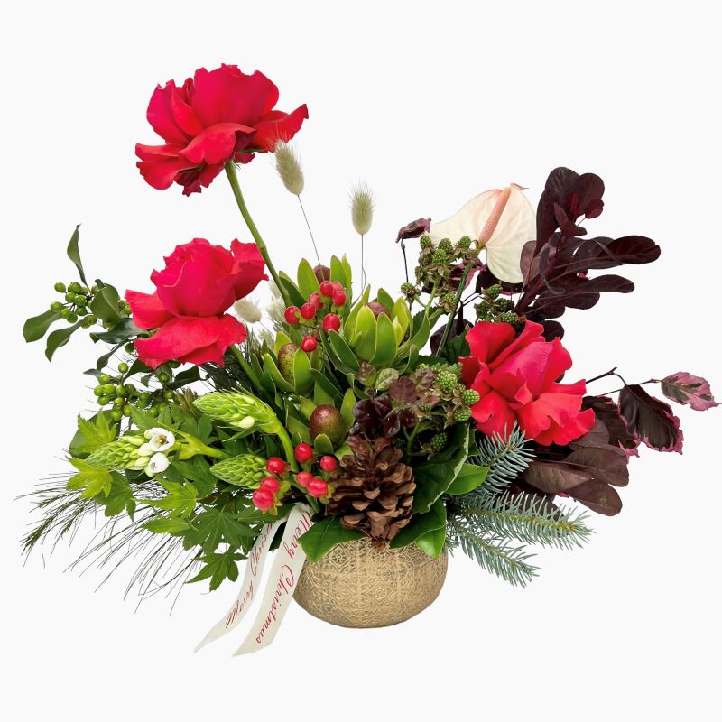 Red rose, red berry, pine cone and seasonal Christmas foliage arrangement.