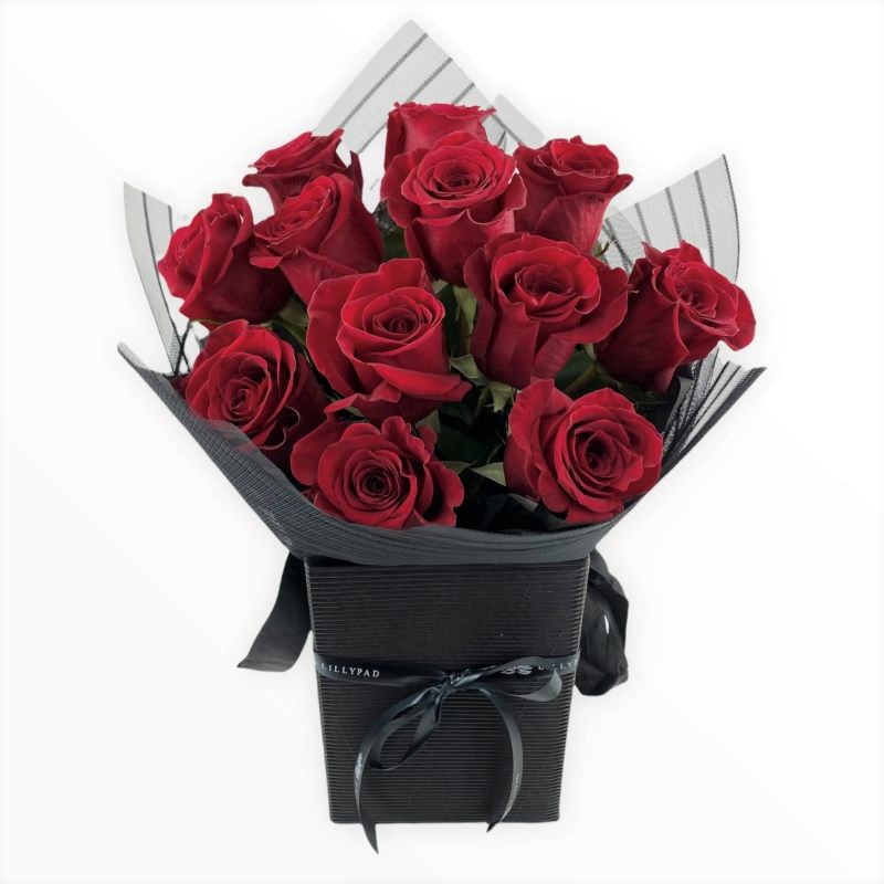 Dozen premium red roses gift wrapped and presented in carry box - Melbourne delivery only.