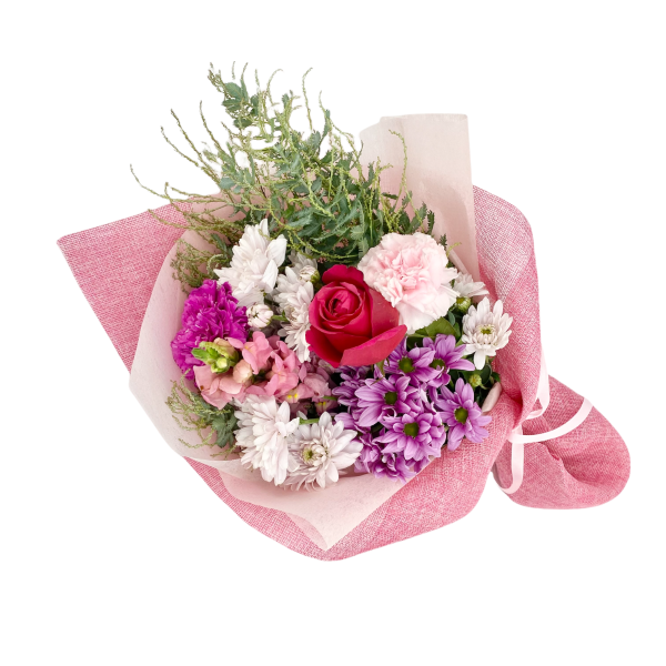 Petite pink bouquet featuring rose, snapdragon, carnations, chrysanthemums.