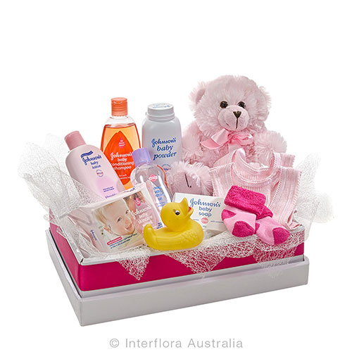 New baby girl gift hamper with teddy and Johnsons baby products.