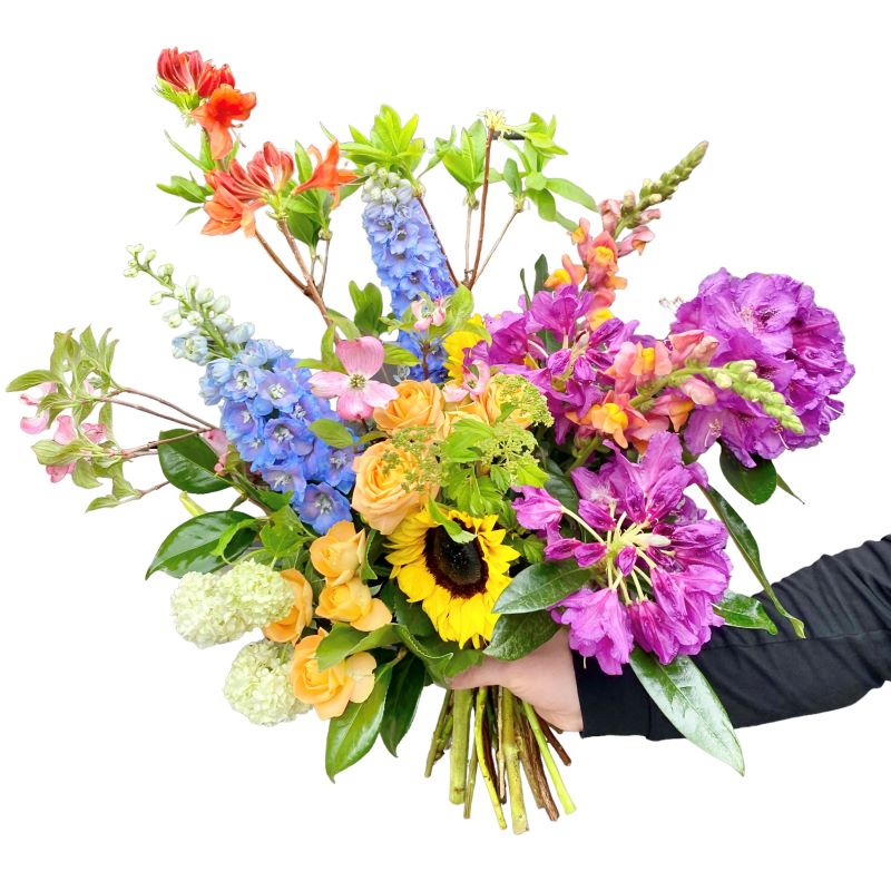 Trust our florists to select the best seasonal spring flowers in your prefered colours. Each bouquet will be unique on every order!